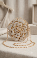 Bolso de mano y roseta de cristal 3D